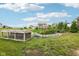Well-maintained backyard garden with raised beds and chicken coop offers a peaceful outdoor space at 2105 Granville Dr, Westfield, IN 46074