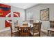 The dining room is well-lit and beautifully decorated with stylish artwork at 2105 Granville Dr, Westfield, IN 46074