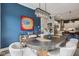 Dining room with designer chandelier, seating for six, and modern decor accents at 2105 Granville Dr, Westfield, IN 46074