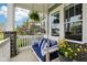 Relaxing front porch featuring a comfortable porch swing and decorative potted flowers at 2105 Granville Dr, Westfield, IN 46074