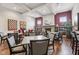 Bright game room with ample table seating, a cozy fireplace, and a relaxed ambiance at 2105 Granville Dr, Westfield, IN 46074