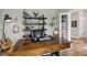 Inviting home office featuring a handsome wooden desk, stylish decor, and an abundance of natural light at 2105 Granville Dr, Westfield, IN 46074