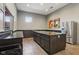 Large kitchen featuring dark granite countertops, stainless steel appliances, and ample cabinet space at 2105 Granville Dr, Westfield, IN 46074