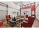 Inviting lounge area with comfortable seating and stylish decor under a unique chandelier at 2105 Granville Dr, Westfield, IN 46074