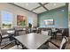 Spacious meeting room featuring ample table seating, natural light, and relaxed ambiance at 2105 Granville Dr, Westfield, IN 46074