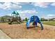 Vibrant blue climbing structure and slides in a well-maintained community playground area at 2105 Granville Dr, Westfield, IN 46074