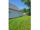 Side view of a home with simple architecture with a grassy backyard at 2170 S East St, Indianapolis, IN 46225