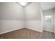 Bright bedroom featuring plush carpeting, natural light from a window, and neutral paint at 2170 S East St, Indianapolis, IN 46225