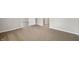 Neutral bedroom featuring modern carpeting with easy access to adjoining rooms, perfect for versatile living at 2170 S East St, Indianapolis, IN 46225