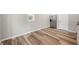 Bright room featuring hardwood floors, stainless steel fridge and neutral paint at 2170 S East St, Indianapolis, IN 46225