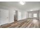 Bright living room featuring hardwood floors, ample natural light, and neutral paint at 2170 S East St, Indianapolis, IN 46225