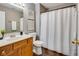 Bathroom with wood vanity, marble countertop, and framed wall art at 2289 Salem Park Dr, Indianapolis, IN 46239