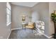 Cozy bedroom corner with comfortable seating and natural light, ideal for a reading nook or quiet retreat at 2289 Salem Park Dr, Indianapolis, IN 46239