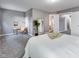 Comfortable bedroom featuring neutral tones, soft carpeting, and easy access to an en-suite bathroom, adding convenience and privacy at 2289 Salem Park Dr, Indianapolis, IN 46239