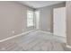 Bedroom with neutral walls, carpet, and door to other rooms at 2289 Salem Park Dr, Indianapolis, IN 46239
