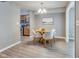 Bright dining area features a round table, four chairs, and modern lighting, perfect for Gathering meals at 2289 Salem Park Dr, Indianapolis, IN 46239