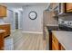Kitchen featuring stainless steel refrigerator and stove, with wood cabinets and plenty of storage space at 2289 Salem Park Dr, Indianapolis, IN 46239