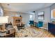 Cozy living room features a classic brick fireplace, comfortable seating, and stylish decor at 2289 Salem Park Dr, Indianapolis, IN 46239