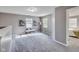 Cozy loft area bathed in natural light from multiple windows, a perfect spot for relaxing or reading at 2289 Salem Park Dr, Indianapolis, IN 46239