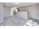 Spacious loft area offering versatility for a playroom or den, complemented by neutral paint and plush carpeting at 2289 Salem Park Dr, Indianapolis, IN 46239