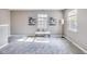 Bright loft space with bench seating near the windows, creating a welcoming and versatile area at 2289 Salem Park Dr, Indianapolis, IN 46239