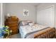 Bedroom with a light wood bed frame and coordinating night stand and dresser at 2421 Creek Bank Dr, Columbus, IN 47201