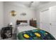 Comfortable bedroom with a soft carpet, neutral colors, and natural light at 2421 Creek Bank Dr, Columbus, IN 47201