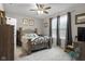 Relaxing bedroom with a unique bed frame, neutral colors and natural light at 2421 Creek Bank Dr, Columbus, IN 47201