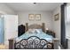 Cozy bedroom featuring a decorative bed frame, neutral tones, and a peaceful ambiance at 2421 Creek Bank Dr, Columbus, IN 47201