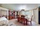 Charming dining room with traditional furniture, chandelier, and natural light from the window at 290 S Buffalo Hill Rd, Martinsville, IN 46151