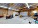 Large garage space featuring multiple garage doors and ample storage, ideal for various projects at 290 S Buffalo Hill Rd, Martinsville, IN 46151