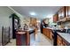 Kitchen with wood cabinets and modern appliances at 290 S Buffalo Hill Rd, Martinsville, IN 46151