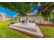 A patio in backyard with outdoor seating and mature trees at 3025 Sable Ridge Ln, Greenwood, IN 46142