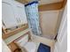 Cozy bathroom features built-in storage and a shower/tub combination at 3025 Sable Ridge Ln, Greenwood, IN 46142