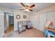 A serene bedroom featuring cozy chairs and ample closet space at 3025 Sable Ridge Ln, Greenwood, IN 46142