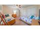 Bright bedroom with twin beds, closet, and dresser at 3025 Sable Ridge Ln, Greenwood, IN 46142