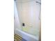 Clean bathroom with white tile and shower-tub combination at 3115 E 400 S, Anderson, IN 46017