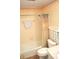 Cozy bathroom featuring a shower-tub combo with floral accents above the tiled walls at 3115 E 400 S, Anderson, IN 46017