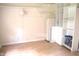 Spacious office area with light wood flooring and built-in shelving for storage and organization at 3115 E 400 S, Anderson, IN 46017