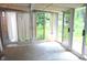 Bright sunroom featuring large windows offering panoramic views and natural light at 3115 E 400 S, Anderson, IN 46017