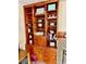 Charming built-in bookcase featuring open shelving and lower cabinet storage at 313 S Brittain Ave, Muncie, IN 47303