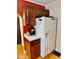 This kitchen is equipped with a refrigerator and coffee maker, creating a functional setup at 313 S Brittain Ave, Muncie, IN 47303