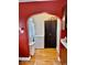 Eat-in kitchen featuring an arched doorway, offering ample storage and a seamless transition at 313 S Brittain Ave, Muncie, IN 47303