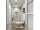 Updated bathroom features a modern glass shower with tiled walls and a built-in niche at 3707 E Wilson Dr, Mooresville, IN 46158