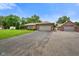 Lovely ranch home showcasing an attached garage and meticulously maintained landscaping at 3707 E Wilson Dr, Mooresville, IN 46158