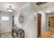 Hallway featuring patterned floors and a rustic wooden console table at 3707 E Wilson Dr, Mooresville, IN 46158