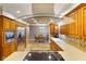 Bright kitchen with stainless steel appliances, abundant cabinetry, and easy transition to the dining room, designed for efficiency at 3707 E Wilson Dr, Mooresville, IN 46158