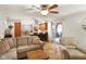 Spacious living room with open floor plan, comfortable seating, and easy access to the kitchen, ideal for modern living at 3707 E Wilson Dr, Mooresville, IN 46158