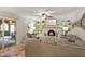 Inviting living room with fireplace, built-in shelves, and comfortable seating, perfect for relaxation and socializing at 3707 E Wilson Dr, Mooresville, IN 46158