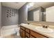 Well-lit bathroom features double sinks, modern fixtures, and a large soaking tub at 3872 Dusty Sands Rd, Whitestown, IN 46075